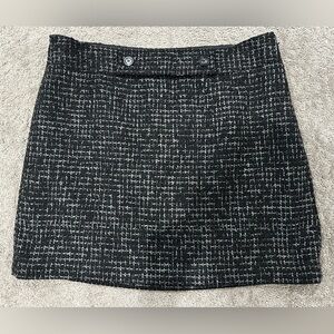 Women’s size 14 skirt by the loft. Black and gray woven material side zipper.